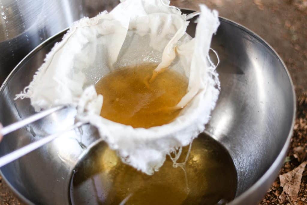 Straining tallow cheesecloth